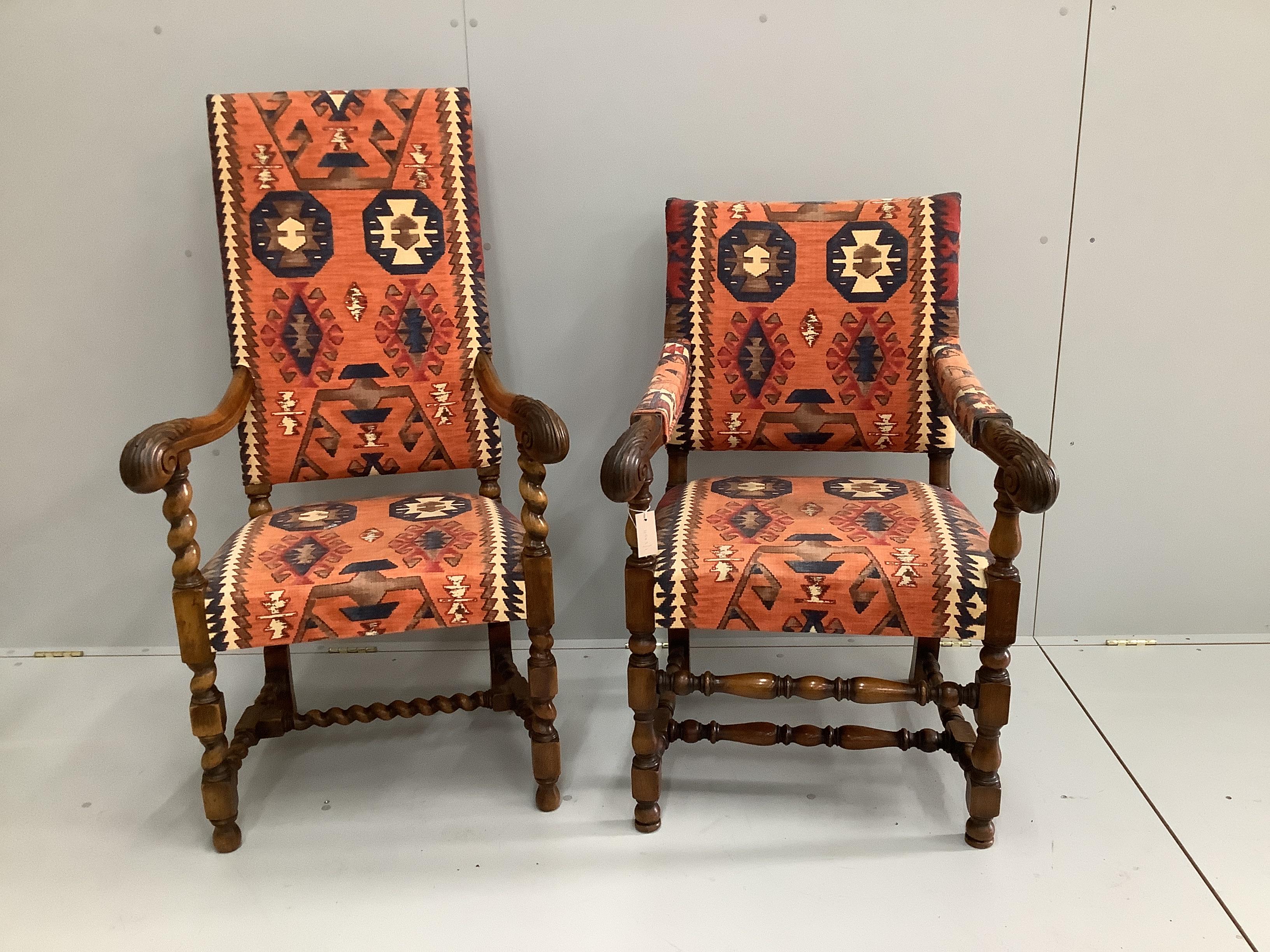 Two 1920's Jacobean Revival carved walnut elbow chairs with Kilim fabric upholstery, larger width 65cm, depth 50cm, height 124cm